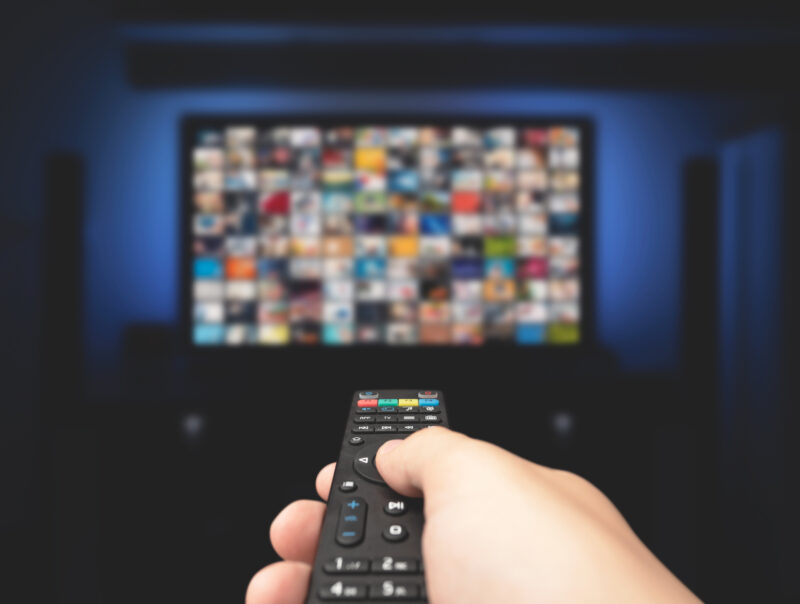 A remote pointing at a television